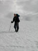 Sarah sliding down a big snowfield ...