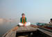 Rain and ghee lamps on boat