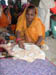 Woman showing the embroidery