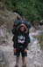 First porter carrying Rains pack
