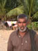 Kasaragod, Kerala: Men at the beach at the Indian Ocean