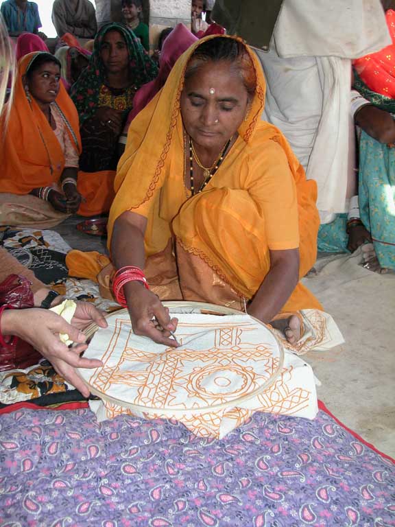 Woman showing the embroidery