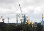 ... surrounded by cranes