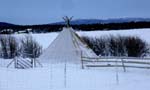 A �<i>k�ta</i>� (tipi) and the frozen river behind