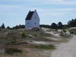 <i>�Den Tilsandede Kirke�:</i> (The church sunk in sand)