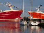 The fishing boats are enormous !